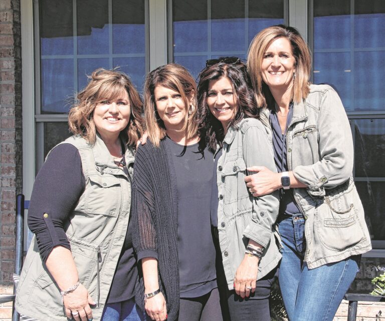 Warrior Bags founders, four women smiling together outside, representing the nonprofit's mission of cancer support